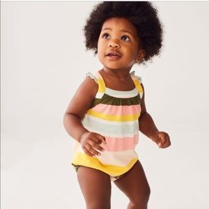 Cross-back romper with adjustable straps